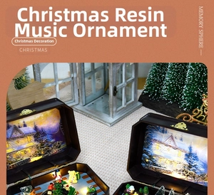 Close-up of vintage resin Christmas music box with detailed miniature winter village scene