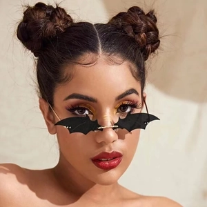 Lunettes de soleil chauve-souris sans monture avec branches en métal doré de fête