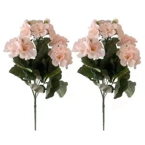 Two realistic pink artificial geranium flower bouquets with green leaves and stems