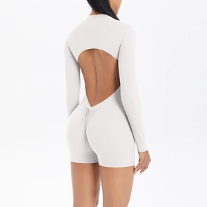 Detailed back view of open-back grey romper showing scrunch butt and cutout yoga design