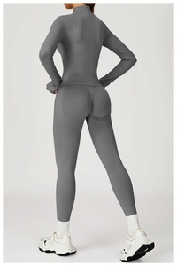 Slim fit gray yoga jacket showing back view of high-stretch athletic knit fabric