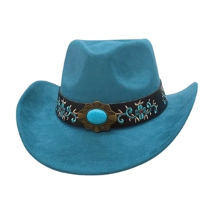Detail of turquoise cowboy hat featuring an embroidered floral band and turquoise gemstone