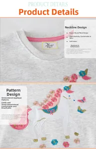 Detail eines grauen Mädchen-Sweatshirts mit bunter Einhorn-Applikation und Stickerei