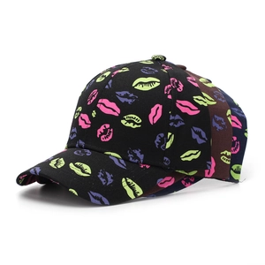 Detailed stack of cotton baseball caps featuring colorful pop art lip print patterns