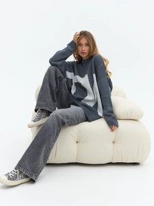 Navy blue oversized knit sweater with jacquard graphics and slouchy drop-shoulder fit