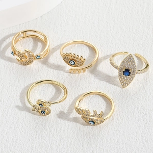 5-piece gold plated evil eye and moon ring set with blue zircon and snake design