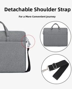 Detailansicht des abnehmbaren Schultergurts und Metallhakens einer grauen Laptoptasche