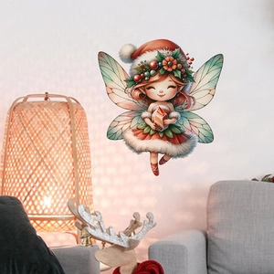 Detail showing the Christmas fairy wall sticker in red and green colors on a cozy living room wall