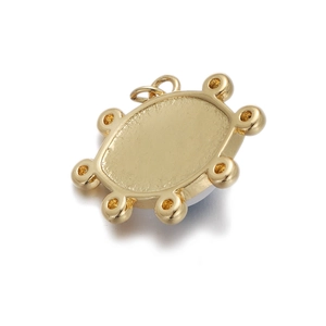Detailed view of an oval gold-plated evil eye pendant base with beaded edges