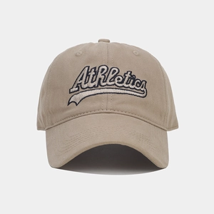 Detailed close-up of blue Athletics embroidery on khaki cotton vintage baseball cap
