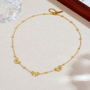Minimalist gold plated stainless steel beaded chain necklace with bow pendants for women