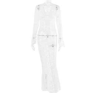Close-up of the delicate white lace pattern and sheer texture on a long-sleeved dress