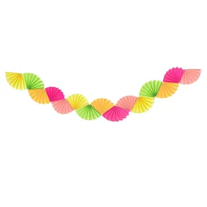 Close-up of colorful pleated paper fan garland for festive party and wedding decoration