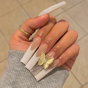 Extra-long French press-on nails with 3D metal butterfly and elegant white gradient tips