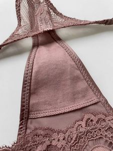 Detail of rose pink lace stitching and high-quality sewing on high-cut thong underwear