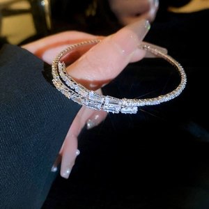 Close-up of sparkling zircon open bracelet with double-layer design and starry flare effect