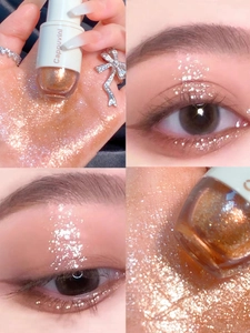 Detalle de sombra de ojos líquida con purpurina oro champán y un acabado brillante