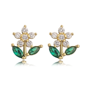 Minimalist gold flower stud earrings with clear and green zircon stones on white background