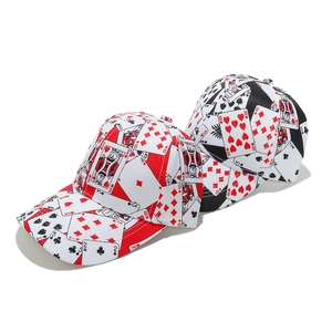 Close-up of poker print baseball caps with heart and spade patterns in red and black