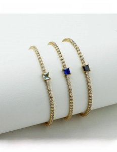 Detail of titanium steel bracelets with blue and black zircon square gemstones