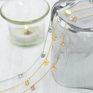 Three-tone heart zircon necklace set in gold, silver, and rose gold finishes