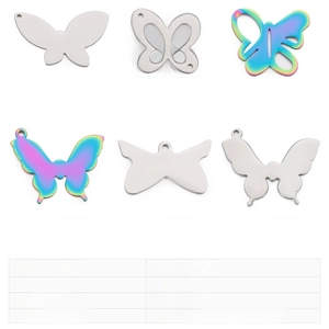 Macro detail of stainless steel butterfly charms in silver and rainbow finish colors