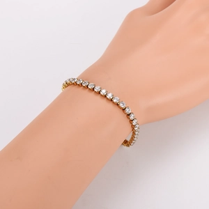 Elegantes vergoldetes Edelstahl-Tennisarmband mit funkelnden runden Zirkonia-Steinen