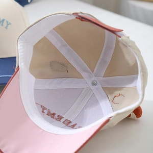 Detail view of the reinforced inner lining and stitching of the toddler baseball cap