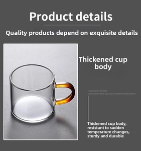 Detail of heat-resistant borosilicate glass tea cup with amber handle and thickened body