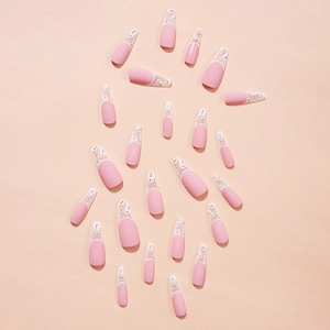 Pink French long coffin press-on nails with white snowman and winter snowflake patterns