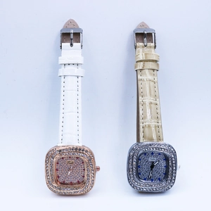 Detail of luxury square quartz watches with full diamond dials and leather straps