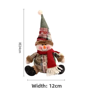 Detailed view of plaid fabric snowman doll with dimensions 24cm height and 12cm width