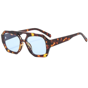 Vintage double bridge sunglasses with tortoise frame and light blue translucent lenses