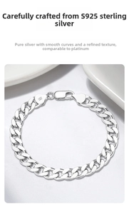 Macro detail of S925 sterling silver Cuban link chain showing Italy hallmark and lobster clasp