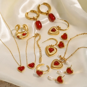 Vintage 18k gold plated stainless steel jewelry set with red carnelian hearts on silk