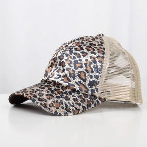 Detail of leopard print trucker hat featuring criss-cross back and breathable mesh