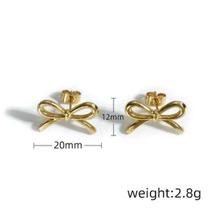 Detail view of gold bow knot earrings showing 20mm width and 12mm height dimensions