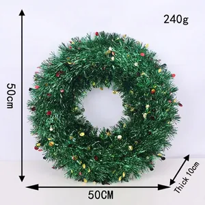 Close-up of a 50cm green Christmas wreath with red and gold sequins and 10cm thickness