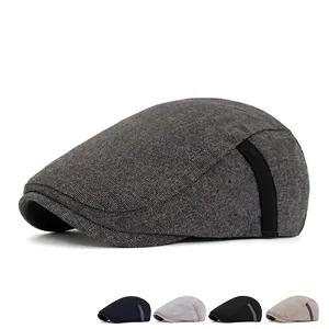 Classic men's vintage newsboy flat cap in dark grey with side ventilation eyelets