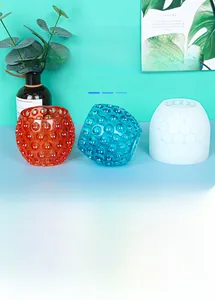 Macro detail of textured silicone candle cup molds with durable embossed dot pattern