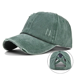 Detail view of the vintage washed green baseball cap with elastic criss-cross ponytail hole