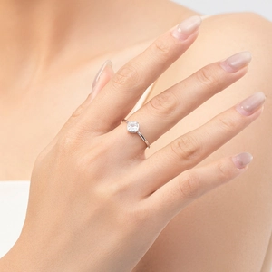 Minimalist S925 sterling silver square diamond ring worn by a model on index finger