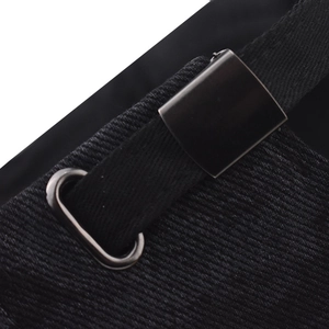 Detail of adjustable matte black metal buckle and corduroy fabric on a baseball cap