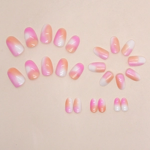 Faux ongles courts ronds avec dégradé ombré rose et orange et finition brillante