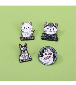 Detail of four medical-themed cartoon animal enamel pins with nurse cat and doctor dog