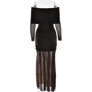 Detail of elegant black off-shoulder dress with ruched bodice and sheer mesh skirt detail