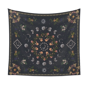 Bohemian moon phase tapestry with floral patterns and stars on a dark background