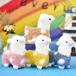 Set of four cute colorful alpaca plush toy pendants in pink yellow blue and brown