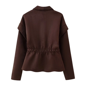 Detail view of the back waist cinch design on a dark brown suede cropped blazer jacket