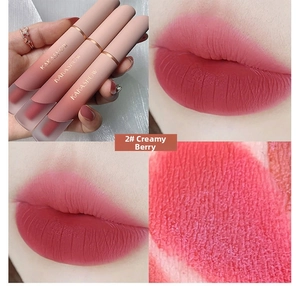 Detail view of matte lip glaze in shade 2 Creamy Berry with texture and swatches